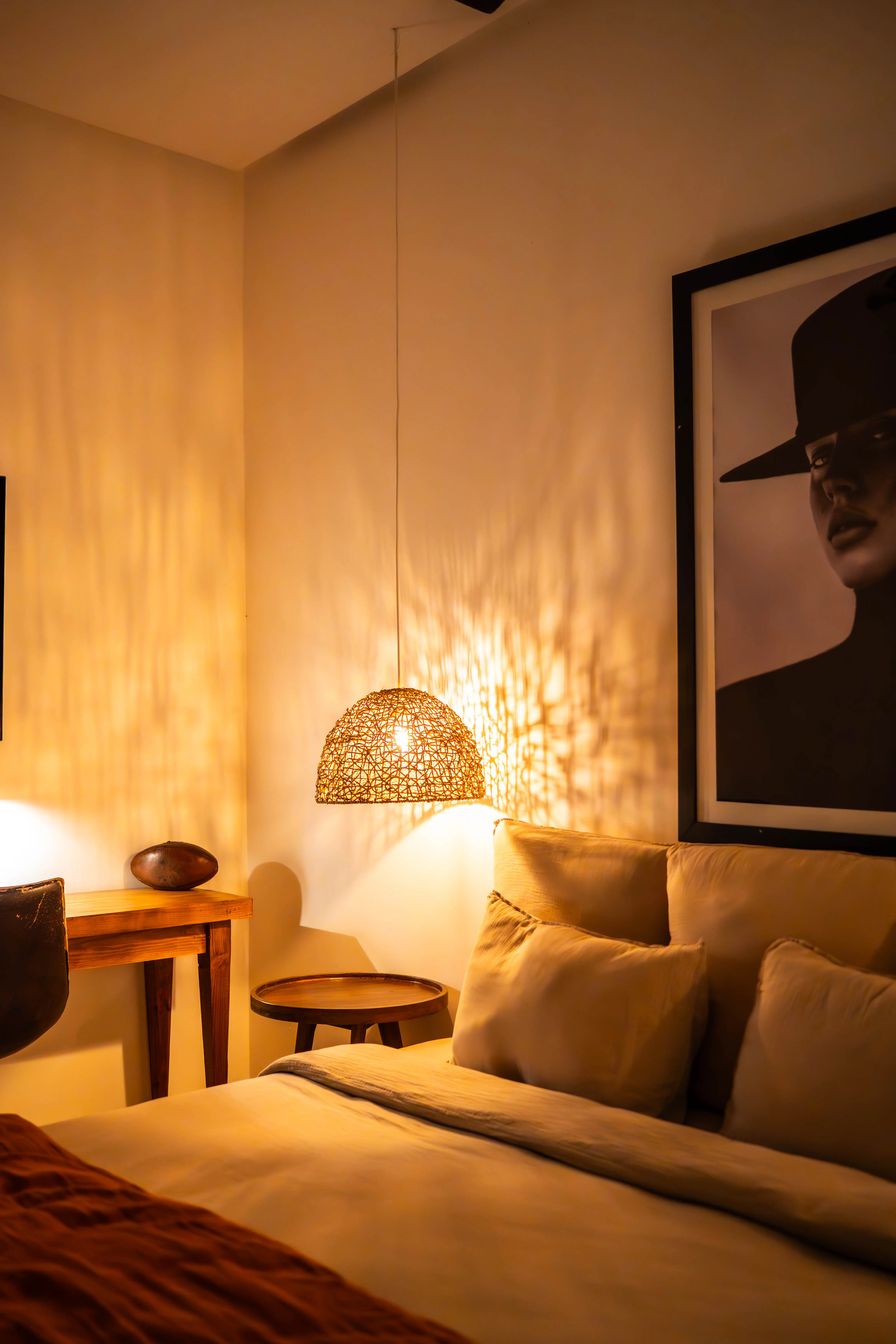 Soft mood lighting in a luxury suite bedroom, creating a sophisticated and romantic haven for adults visiting Marrakech.