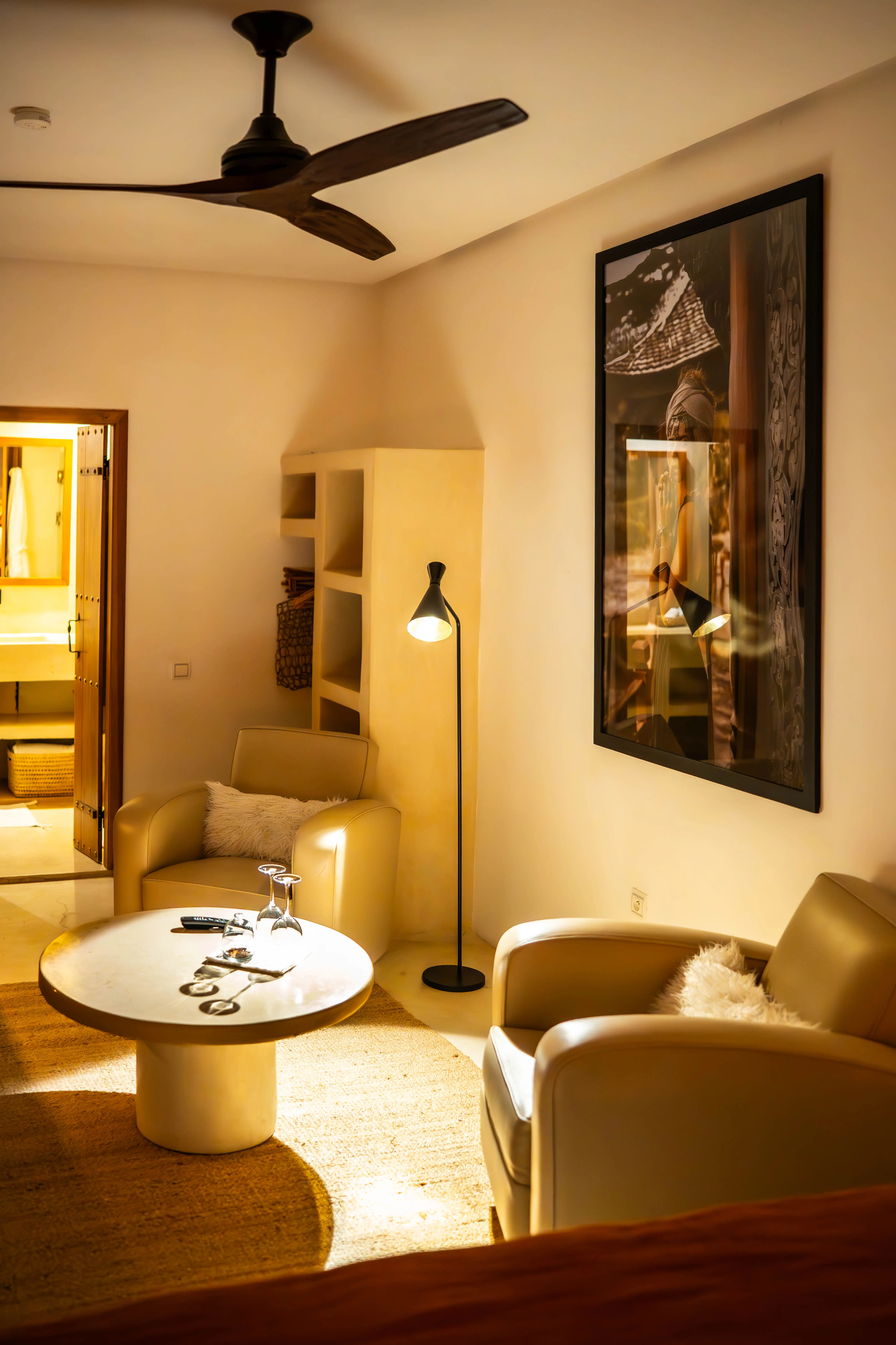 Sophisticated guest suite with warm lighting and elegant seating, perfect for a romantic adults-only escape in Marrakech. Sophisticated guest suite with warm lighting and elegant seating, perfect for a romantic adults-only escape in Marrakech.