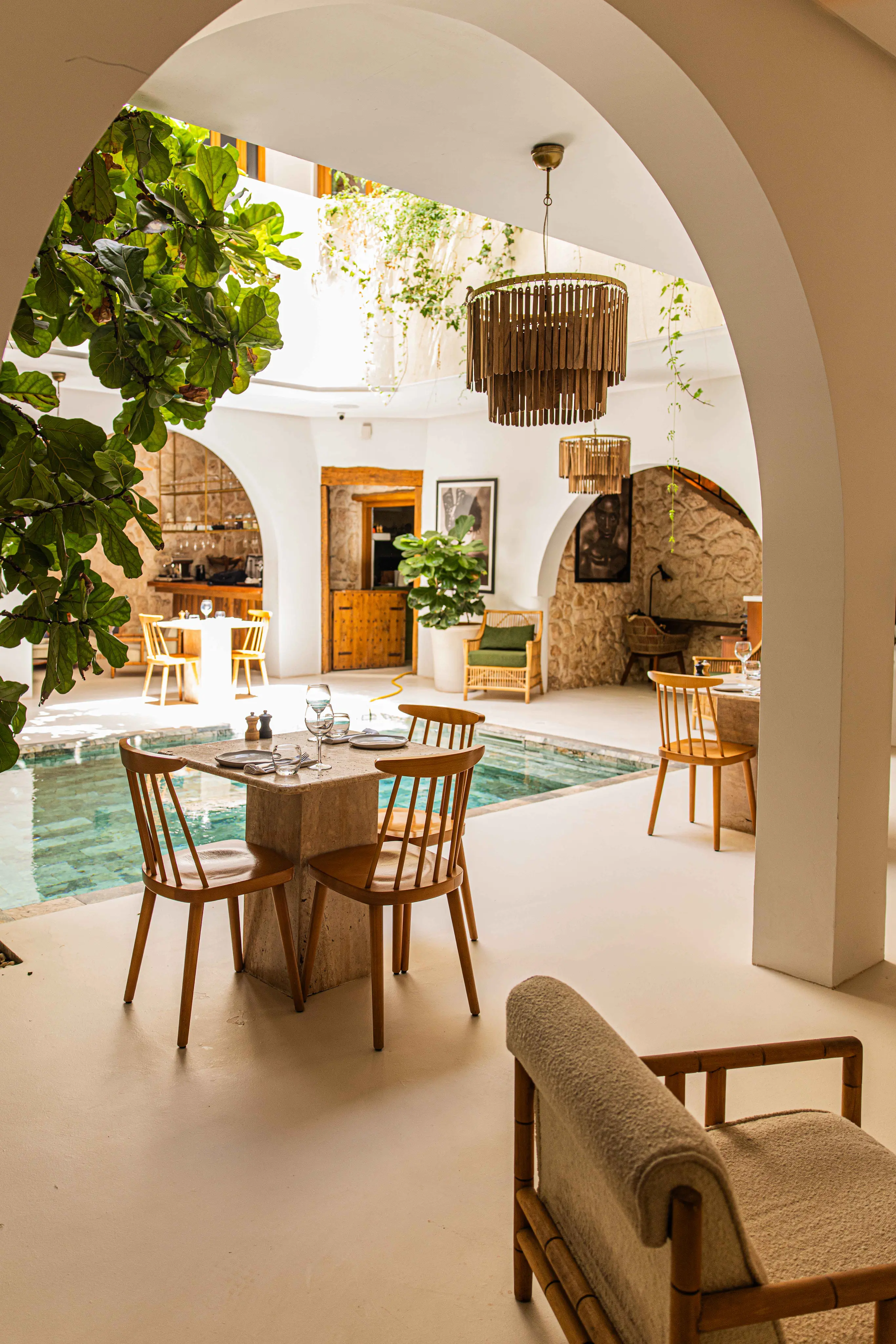 Luxury Courtyard at Pure House Marrakech Riad Elegant courtyard at Pure House Marrakech Riad featuring authentic Moroccan architecture, handcrafted details and a peaceful luxury atmosphere in the Medina of Marrakech.