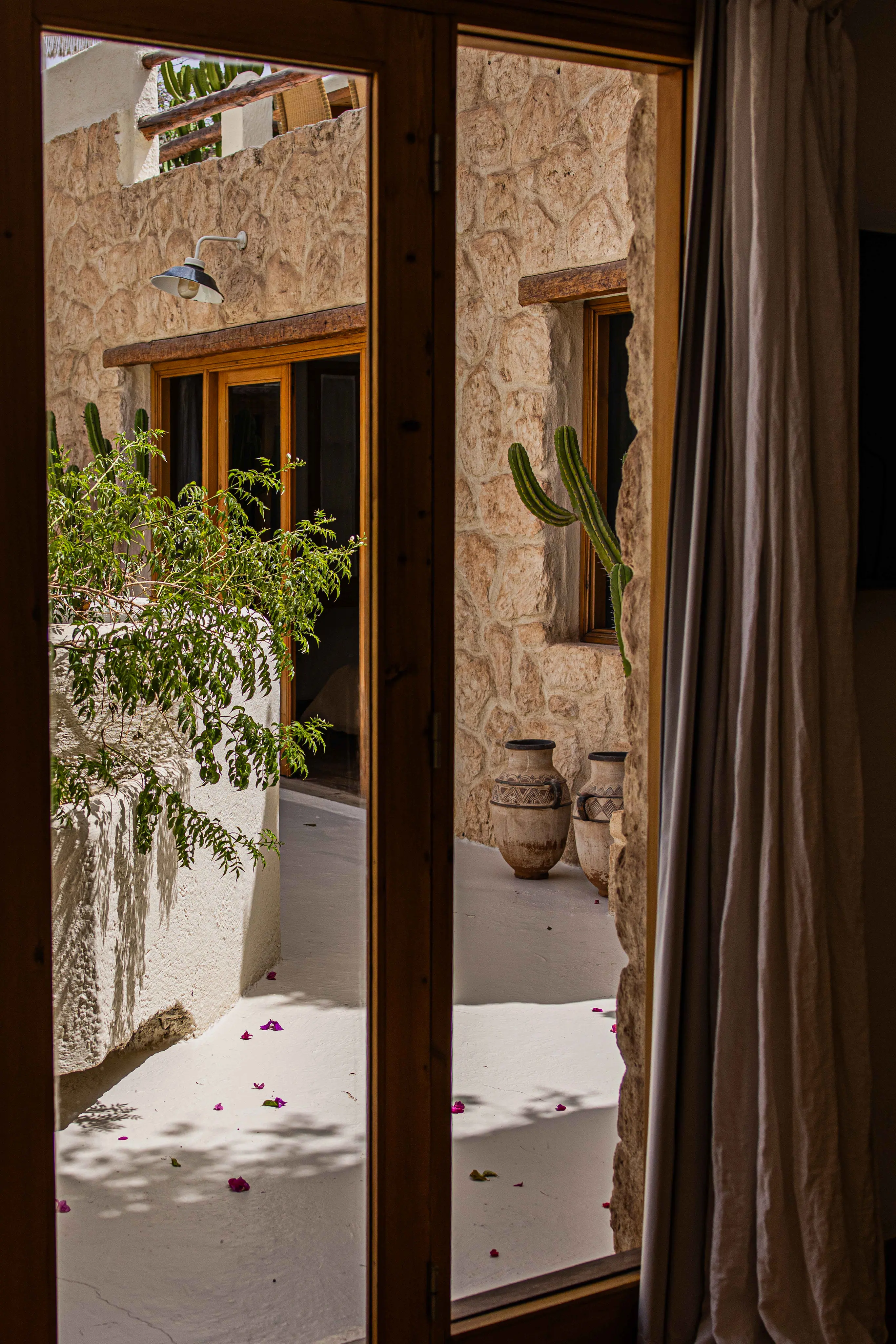 Rooftop Terrace at Pure House Marrakech Riad Rooftop terrace at Pure House Marrakech Riad with panoramic views over the Medina, traditional Moroccan style and an exclusive luxury experience.